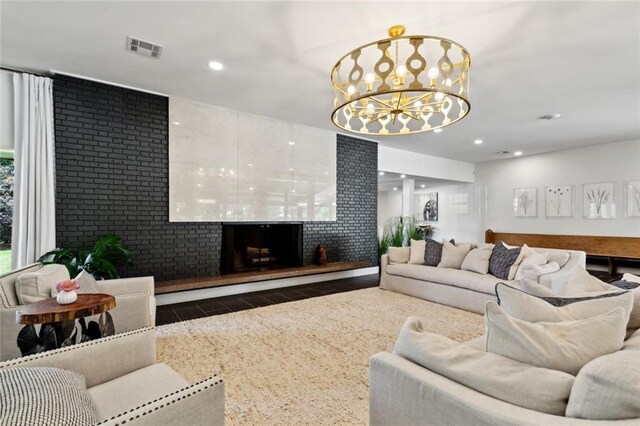 1201 N General Pershing St, Hammond, LA 70401 - living area with a fireplace, a chandelier, and recessed lighting
