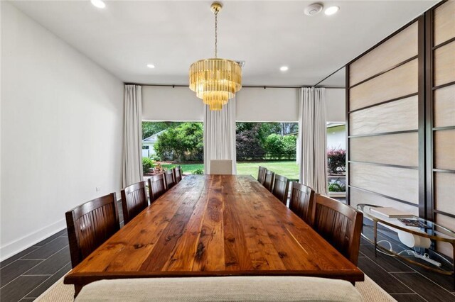 1201 N General Pershing St, Hammond, LA 70401 - dining space featuring a chandelier, recessed lighting, baseboards, and wood tiled floors