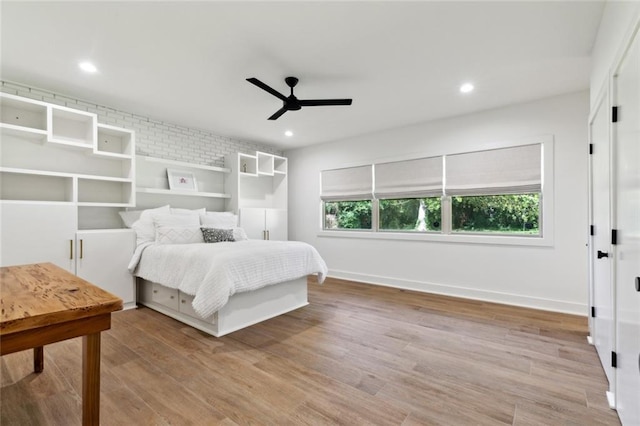 1201 N General Pershing St, Hammond, LA 70401 - bedroom featuring wood finished floors, recessed lighting, baseboards, and a ceiling fan