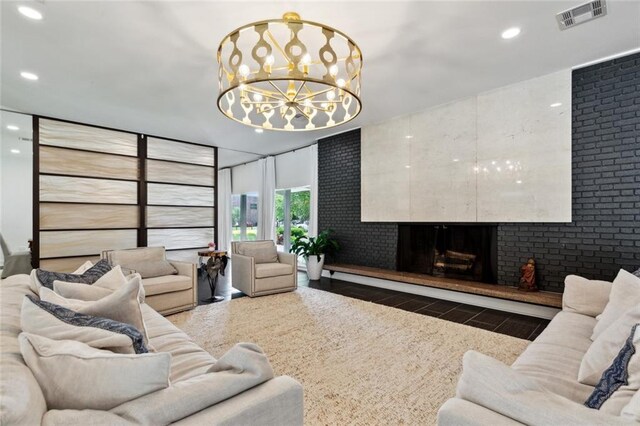 1201 N General Pershing St, Hammond, LA 70401 - living area with a fireplace, a chandelier, and recessed lighting