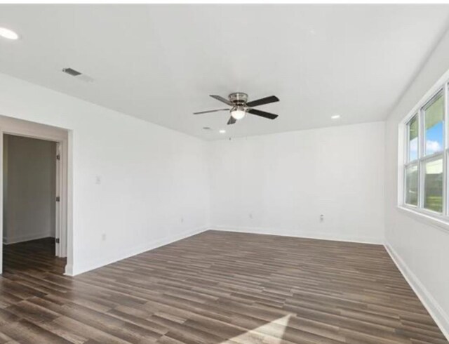 333 Killona Dr, Killona, LA 70057 - empty room with dark wood-style flooring, recessed lighting, ceiling fan, and baseboards
