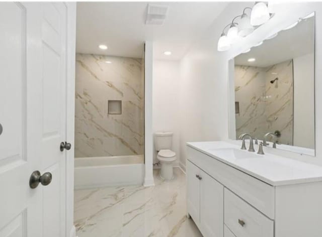 333 Killona Dr, Killona, LA 70057 - bathroom with marble finish floors, toilet, recessed lighting, and vanity