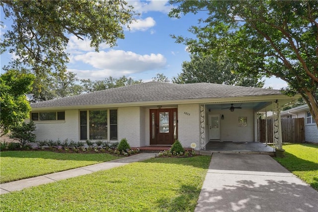 5835 Chamberlain Dr, New Orleans, LA 70122 - single story home featuring concrete driveway, an attached carport, brick siding, and ceiling fan