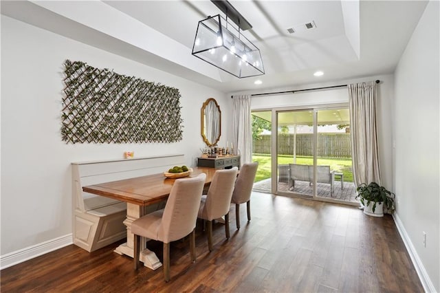 5835 Chamberlain Dr, New Orleans, LA 70122 - dining room with dark wood finished floors, recessed lighting, and baseboards