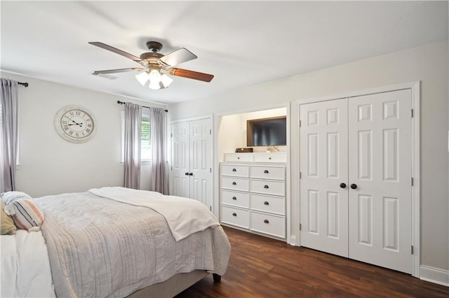 5835 Chamberlain Dr, New Orleans, LA 70122 - bedroom featuring multiple closets, dark wood finished floors, and ceiling fan
