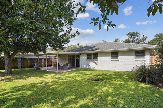 5835 Chamberlain Dr, New Orleans, LA 70122 - back of house with brick siding and a patio area