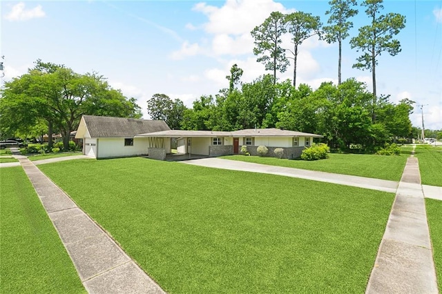 409 Markham Dr, Slidell, LA 70458 - ranch-style house with concrete driveway, a front lawn, and an attached carport