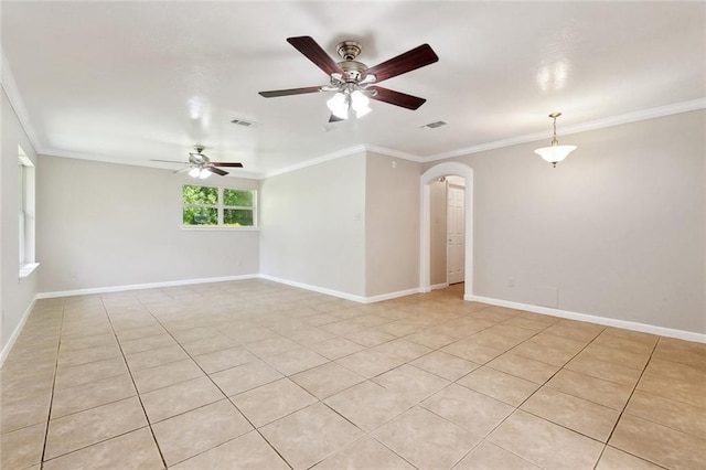 409 Markham Dr, Slidell, LA 70458 - unfurnished room featuring arched walkways, ornamental molding, baseboards, ceiling fan, and light tile patterned floors