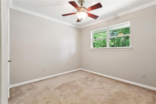 409 Markham Dr, Slidell, LA 70458 - spare room featuring crown molding, carpet flooring, baseboards, and a ceiling fan
