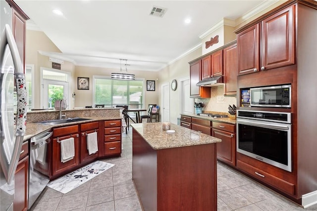 69359 6th Ave, Covington, LA 70433 - kitchen featuring stainless steel appliances, a sink, plenty of natural light, crown molding, and light tile patterned flooring