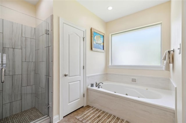 69359 6th Ave, Covington, LA 70433 - bathroom with a stall shower, a jetted tub, and recessed lighting