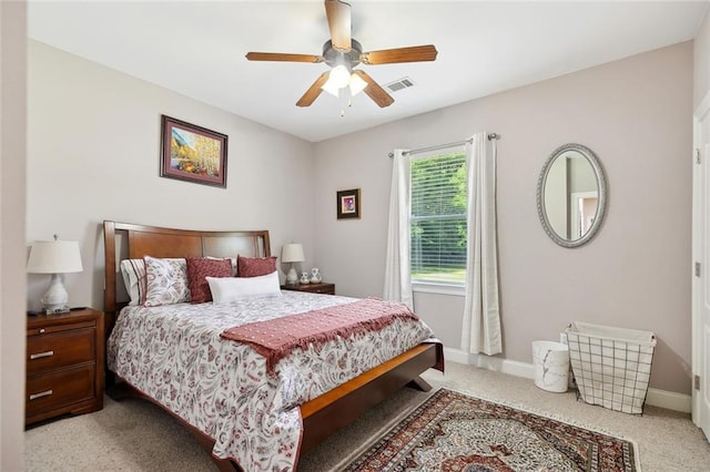 69359 6th Ave, Covington, LA 70433 - bedroom featuring carpet floors, baseboards, and a ceiling fan