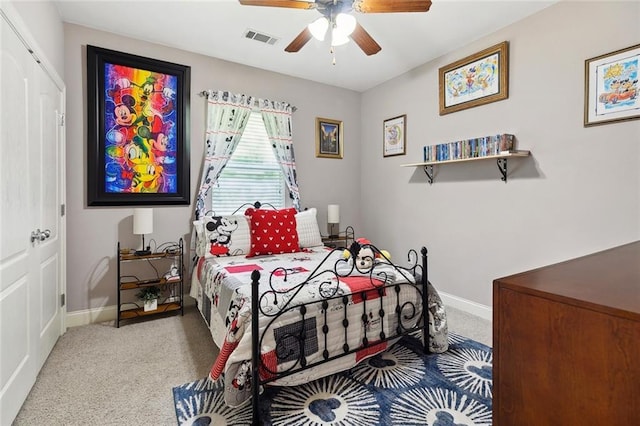 69359 6th Ave, Covington, LA 70433 - carpeted bedroom with baseboards and a ceiling fan