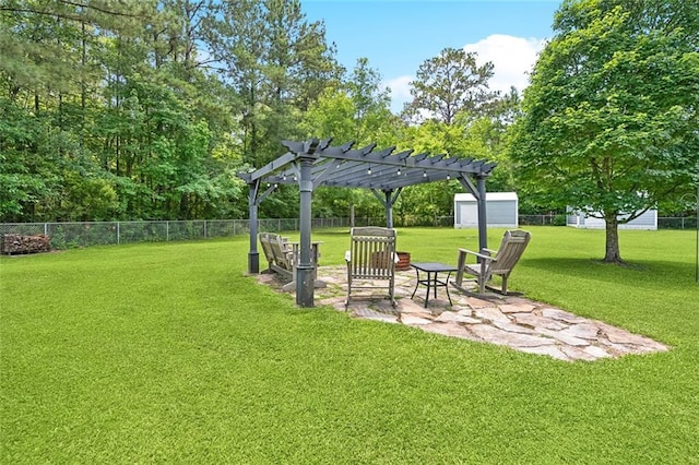 69359 6th Ave, Covington, LA 70433 - view of yard featuring a pergola, a patio, an outdoor structure, and a shed