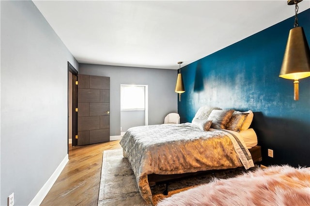 3000 Saint Charles Ave Unit 408, New Orleans, LA 70115 - bedroom with wood finished floors and baseboards