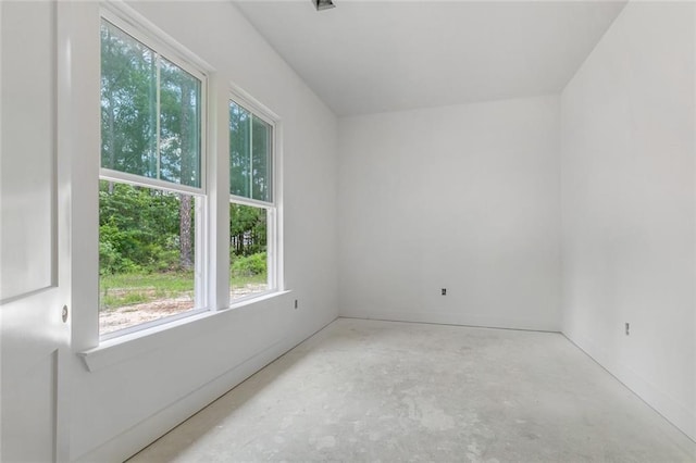 82188 Charles Kelly Rd, Bush, LA 70431 - unfurnished room featuring healthy amount of natural light and unfinished concrete floors