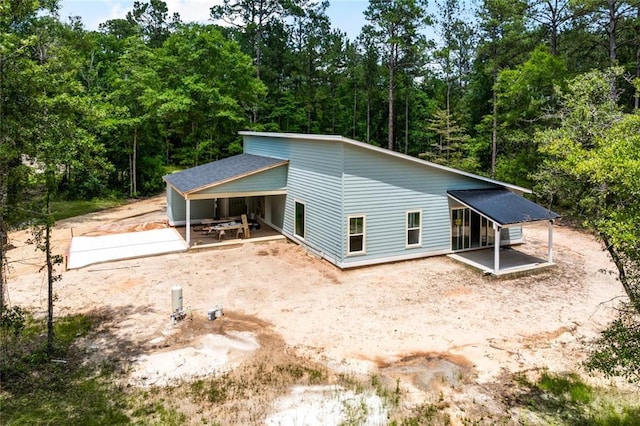 82188 Charles Kelly Rd, Bush, LA 70431 - view of front of house with driveway and a forest view