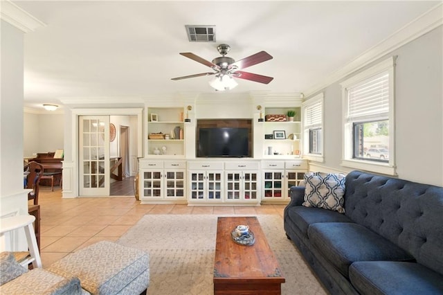 6200 Morton St, Metairie, LA 70003 - living area featuring crown molding, light tile patterned flooring, and ceiling fan