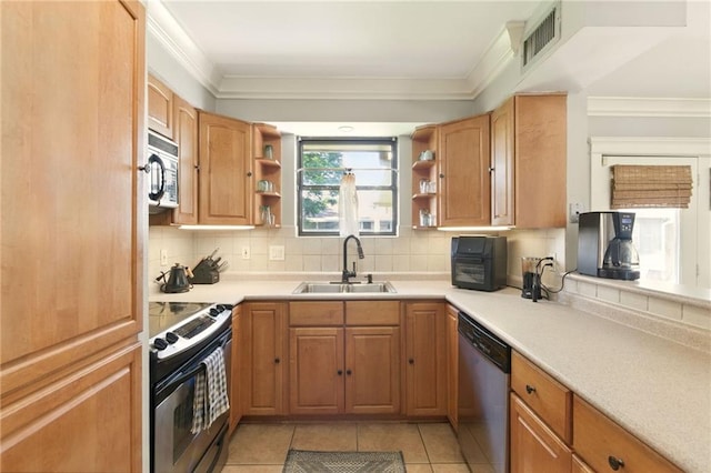 6200 Morton St, Metairie, LA 70003 - kitchen featuring stainless steel appliances, a sink, open shelves, backsplash, and light tile patterned floors