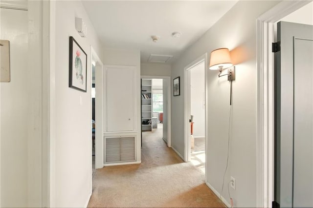 6200 Morton St, Metairie, LA 70003 - hallway with light colored carpet and attic access