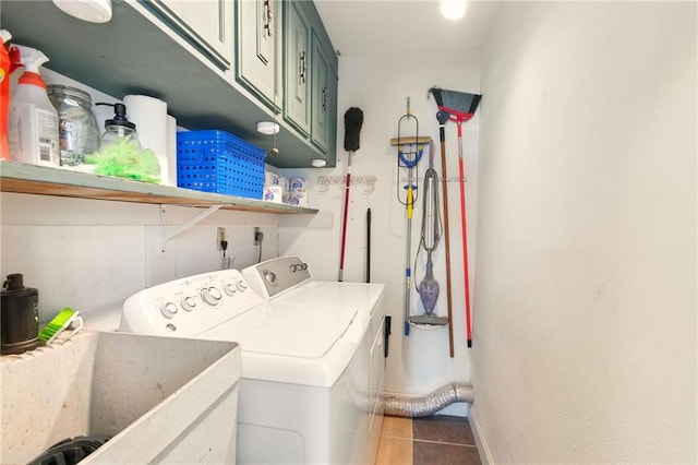 6200 Morton St, Metairie, LA 70003 - clothes washing area with cabinet space, independent washer and dryer, tile patterned floors, and baseboards