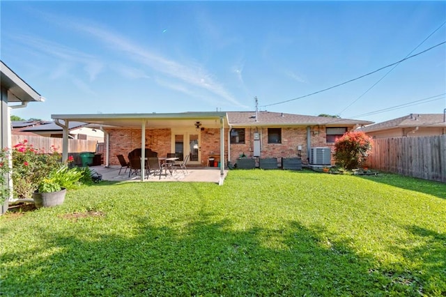 6200 Morton St, Metairie, LA 70003 - back of house with brick siding, central AC unit, and a patio
