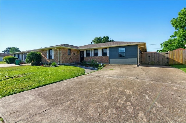 6200 Morton St, Metairie, LA 70003 - single story home featuring brick siding, a gate, and concrete driveway