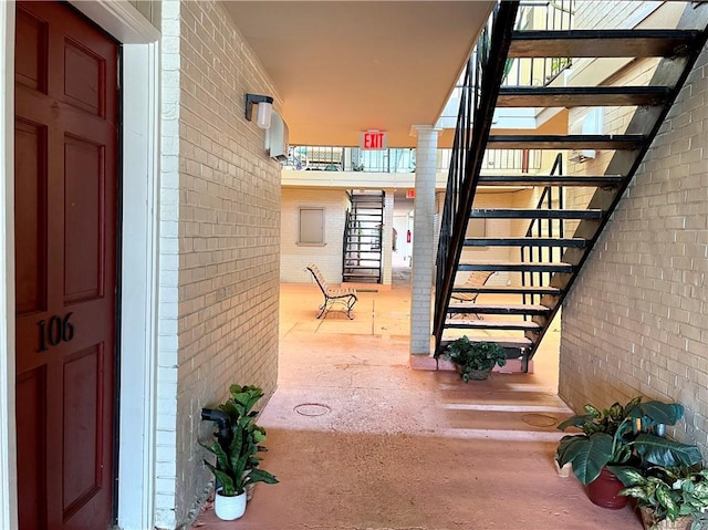 222 London Ave Unit 106, Metairie, LA 70005 - property entrance with brick siding