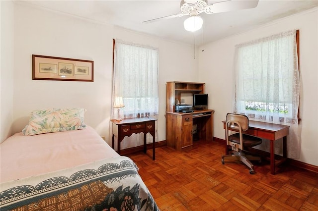 16 Ravan Ave, Harahan, LA 70123 - bedroom with multiple windows, a desk, baseboards, ornamental molding, and a ceiling fan