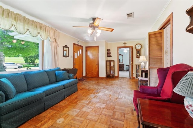16 Ravan Ave, Harahan, LA 70123 - living area featuring a ceiling fan, baseboards, and ornamental molding