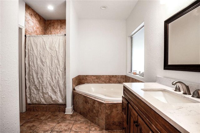 60 Bleu Lake Dr, Covington, LA 70435 - full bath with tiled tub, vanity, a shower with curtain, and tile patterned floors
