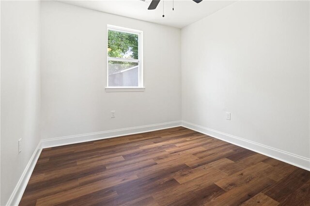 2122 N Butterfly Cir, Terrytown, LA 70056 - empty room with a ceiling fan, dark wood finished floors, and baseboards