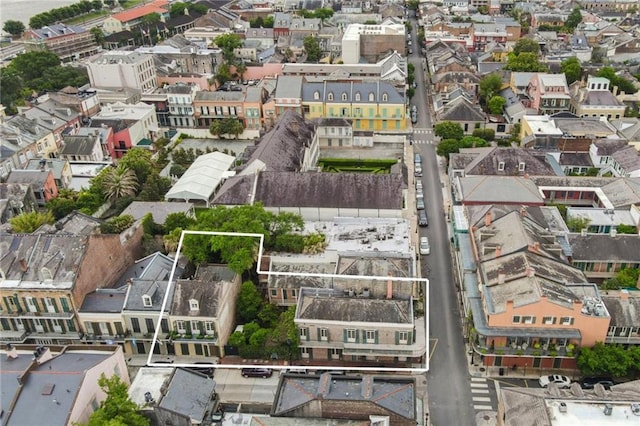 532-38 Governor Nicholls St, New Orleans, LA 70116 - aerial view of property and surrounding area featuring property parcel outlined and nearby suburban area