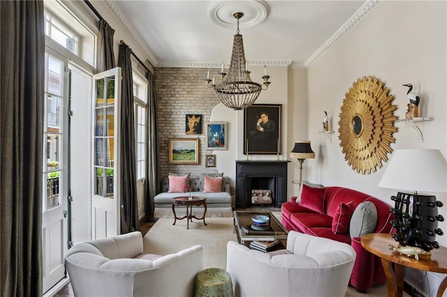 532-38 Governor Nicholls St, New Orleans, LA 70116 - living room featuring a chandelier and ornamental molding