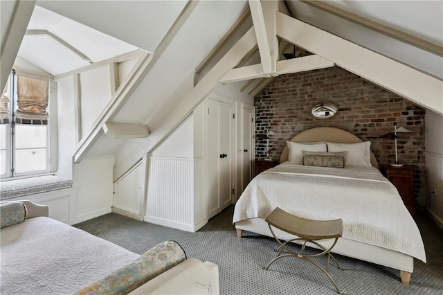 532-38 Governor Nicholls St, New Orleans, LA 70116 - carpeted bedroom featuring brick wall