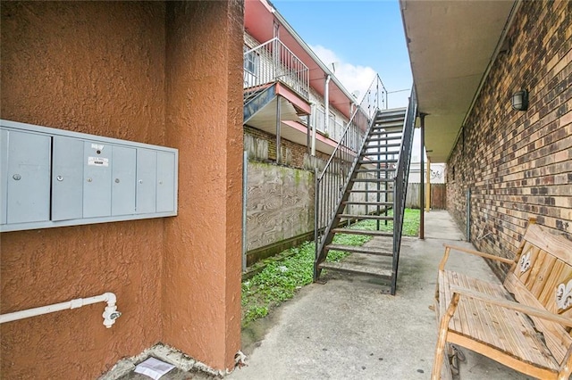 301618 Jean Lafitte Pkwy, Chalmette, LA 70043 - view of patio featuring stairway and mail area