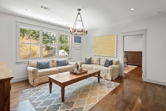 4 Riverdale Dr, Covington, LA 70433 - living room with a chandelier, dark wood-style flooring, baseboards, and recessed lighting