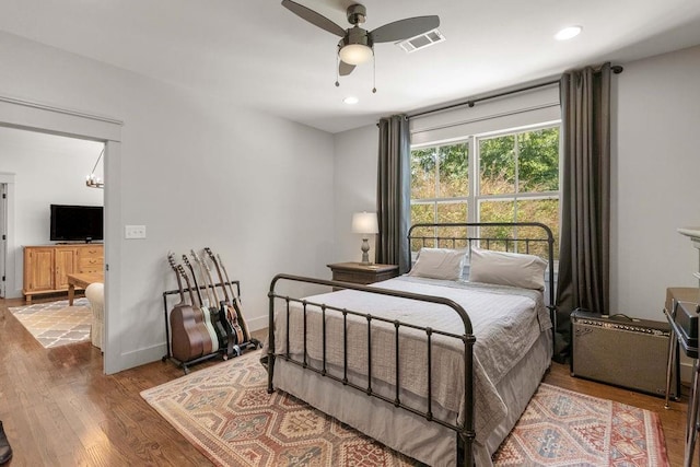 4 Riverdale Dr, Covington, LA 70433 - bedroom with wood finished floors, recessed lighting, and ceiling fan