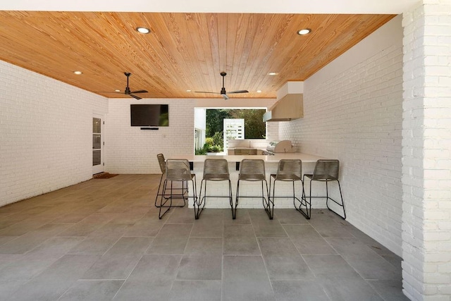 4 Riverdale Dr, Covington, LA 70433 - view of patio with ceiling fan and an outdoor kitchen