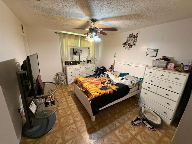 9425 Dancy Ave, Baton Rouge, LA 70814 - bedroom with light flooring, a textured ceiling, and a ceiling fan