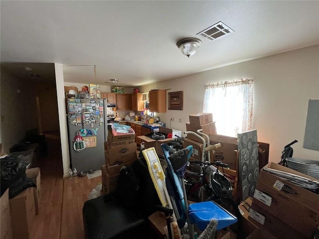 3319 N Dorgenois St, New Orleans, LA 70117 - exercise room featuring wood finished floors and electric panel