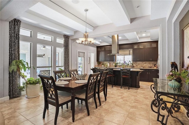 dining area with beamed ceiling, a chandelier, light tile patterned floors, and baseboards