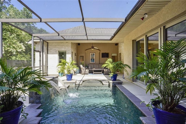 swimming pool with ceiling fan, outdoor lounge area, a patio area, and a lanai