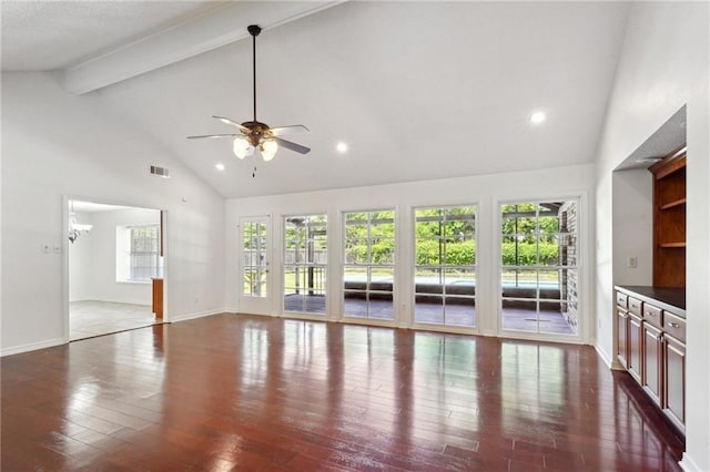 unfurnished living room featuring high vaulted ceiling, healthy amount of natural light, a ceiling fan, dark wood-style flooring, and beam ceiling