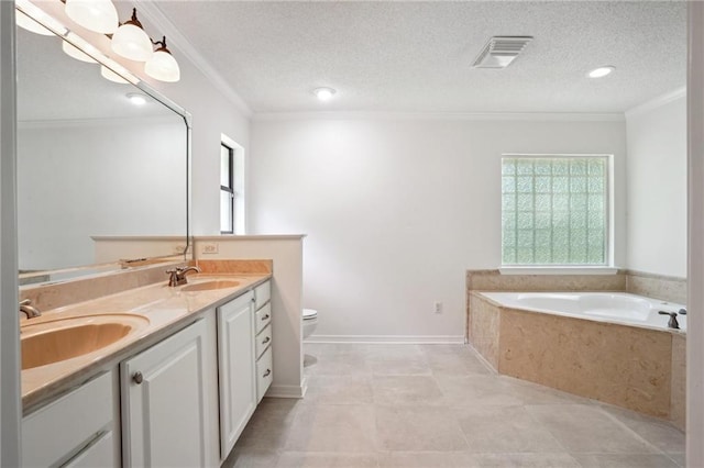 bathroom featuring healthy amount of natural light, crown molding, a bath, double vanity, and toilet