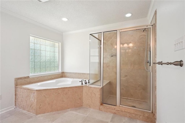 bathroom with a stall shower, a bath, crown molding, a textured ceiling, and recessed lighting
