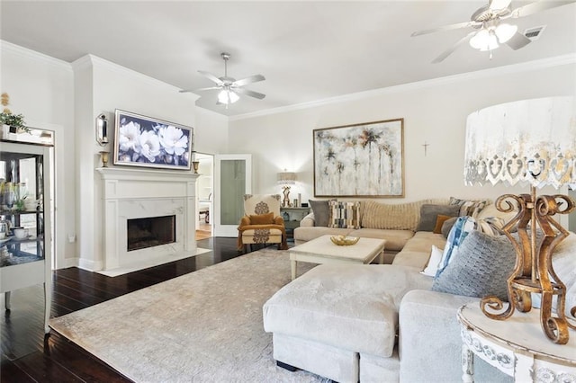 28591 Water Oak Loop, Ponchatoula, LA 70454 - living area with ceiling fan, wood finished floors, ornamental molding, a fireplace, and baseboards