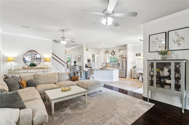 28591 Water Oak Loop, Ponchatoula, LA 70454 - living area featuring crown molding, ceiling fan, stairway, hardwood / wood-style floors, and recessed lighting
