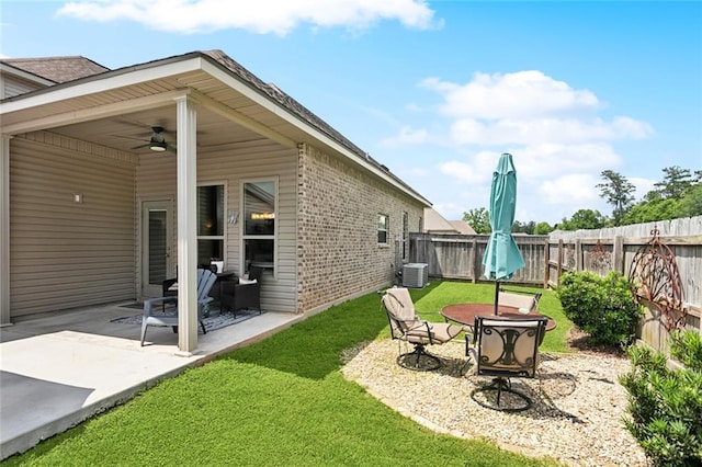 28591 Water Oak Loop, Ponchatoula, LA 70454 - view of yard featuring a patio area, ceiling fan, and central air condition unit