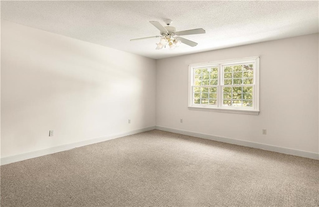125 Bent Tree Ct, Covington, LA 70433 - empty room featuring light carpet, a textured ceiling, baseboards, and ceiling fan